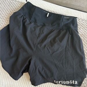 Men’s black running short with built in waistband for storage